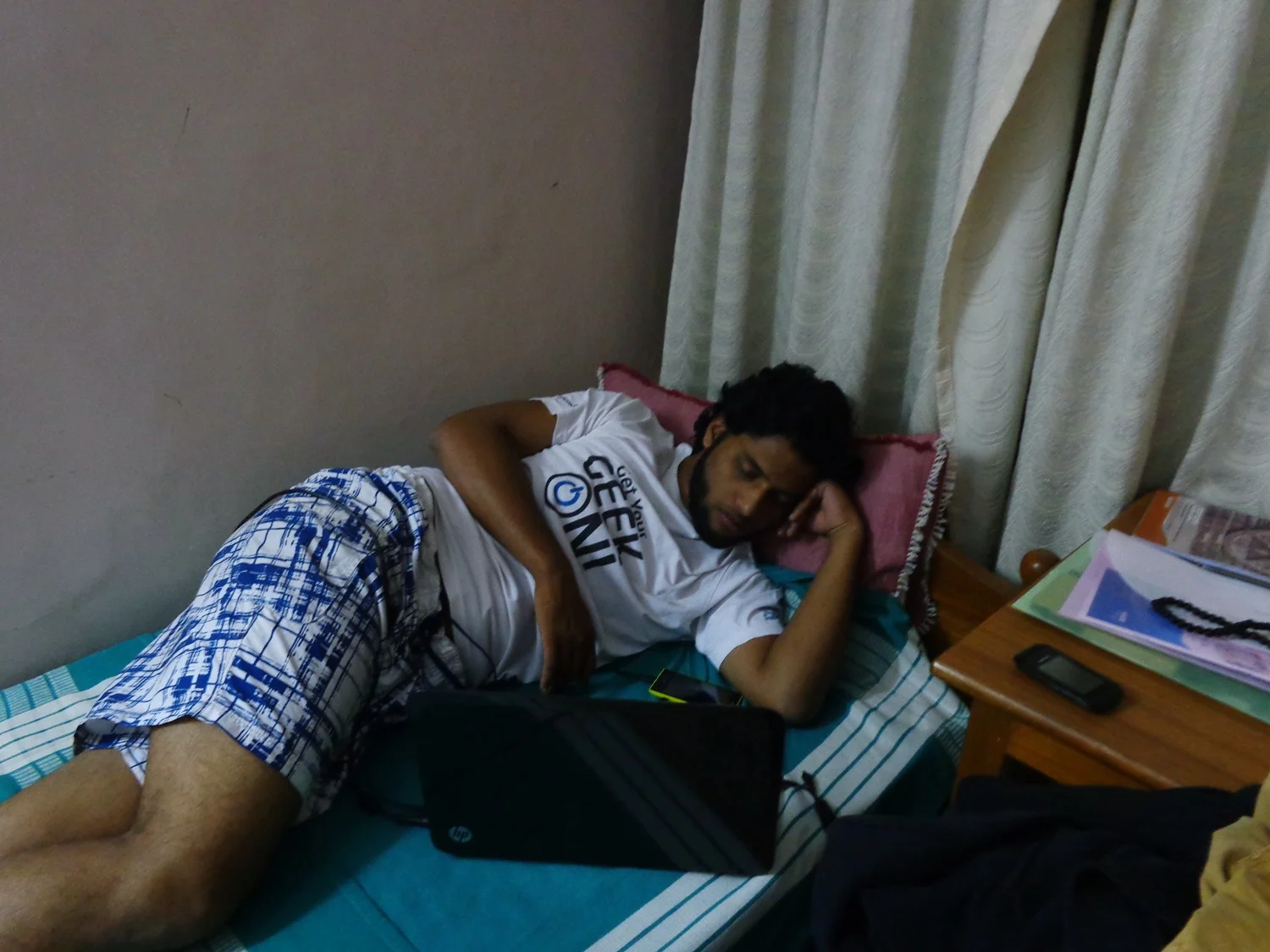 Thejus sleeping with his laptops on and watching film